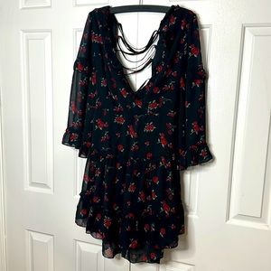 Women dress black and red, non spandex, size Large. Brand new.